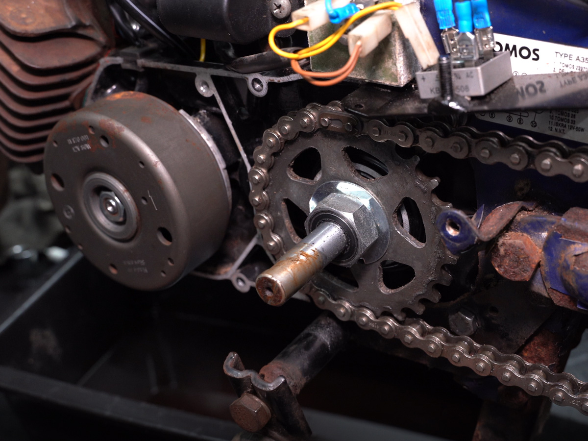 Ignition side cover removed for access to the sprocket and ignition side