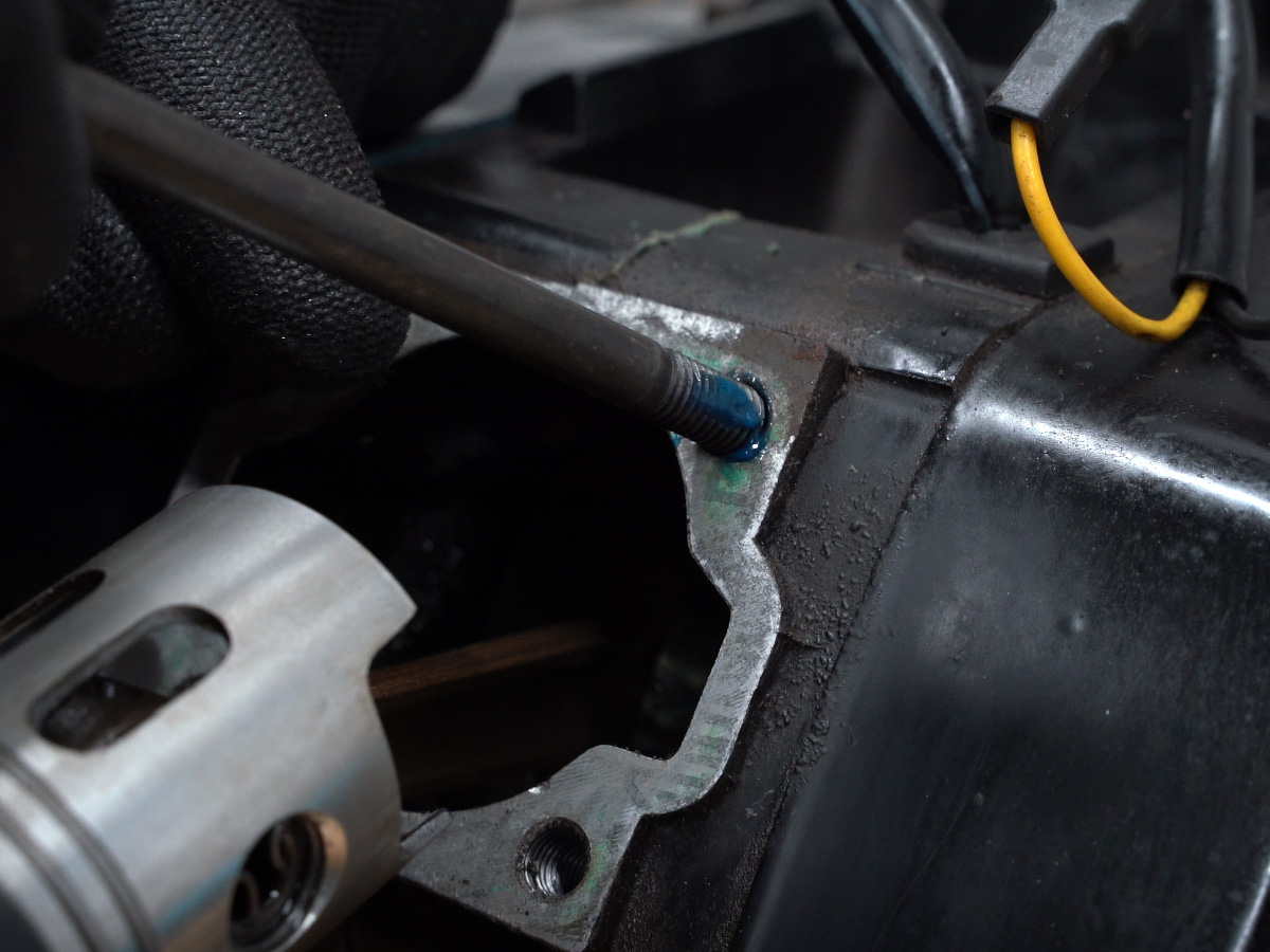 Applying threadlocker to the cylinder studs